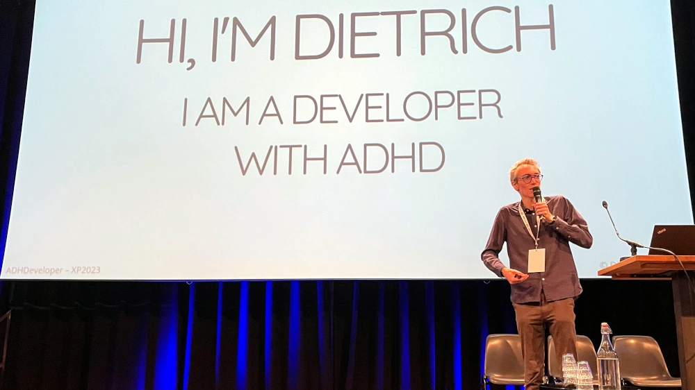 Dietrich presenting 'ADHDeveloper' at XP 2023 Conference in Amsterdam.
